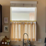 The curtains for the kitchen are simply suitable