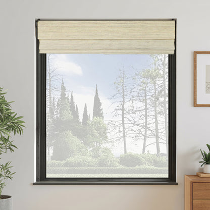 Window with beige roman blind, view of trees outside, plant and dresser on either side.