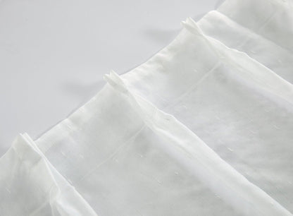 White sheer fabric with subtle texture 